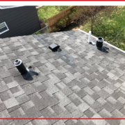 An asphalt shingle roof in the sun.