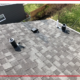 An asphalt shingle roof in the sun.