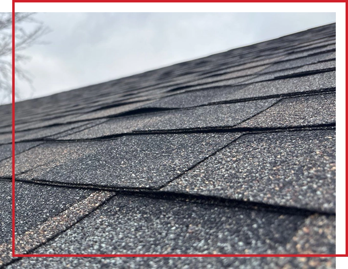 Central Minnesota home with siding and roof exposed after snowmelt, revealing exterior wear