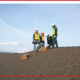 BD Exteriors roofing crew inspecting a Central Minnesota roof.